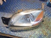 Scheinwerfer links <br>FORD FIESTA IV (JA_, JB_) 1.3I