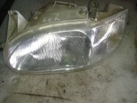 Scheinwerfer links <br>FORD ESCORT VII (GAL, AAL, ABL) 1.4